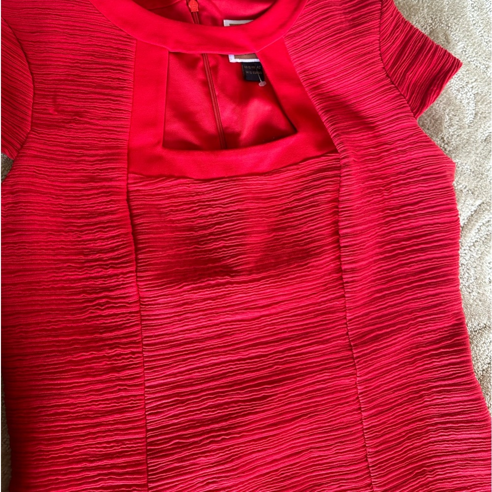 Brand new dress! Gorgeous red color and it has the built in liner
